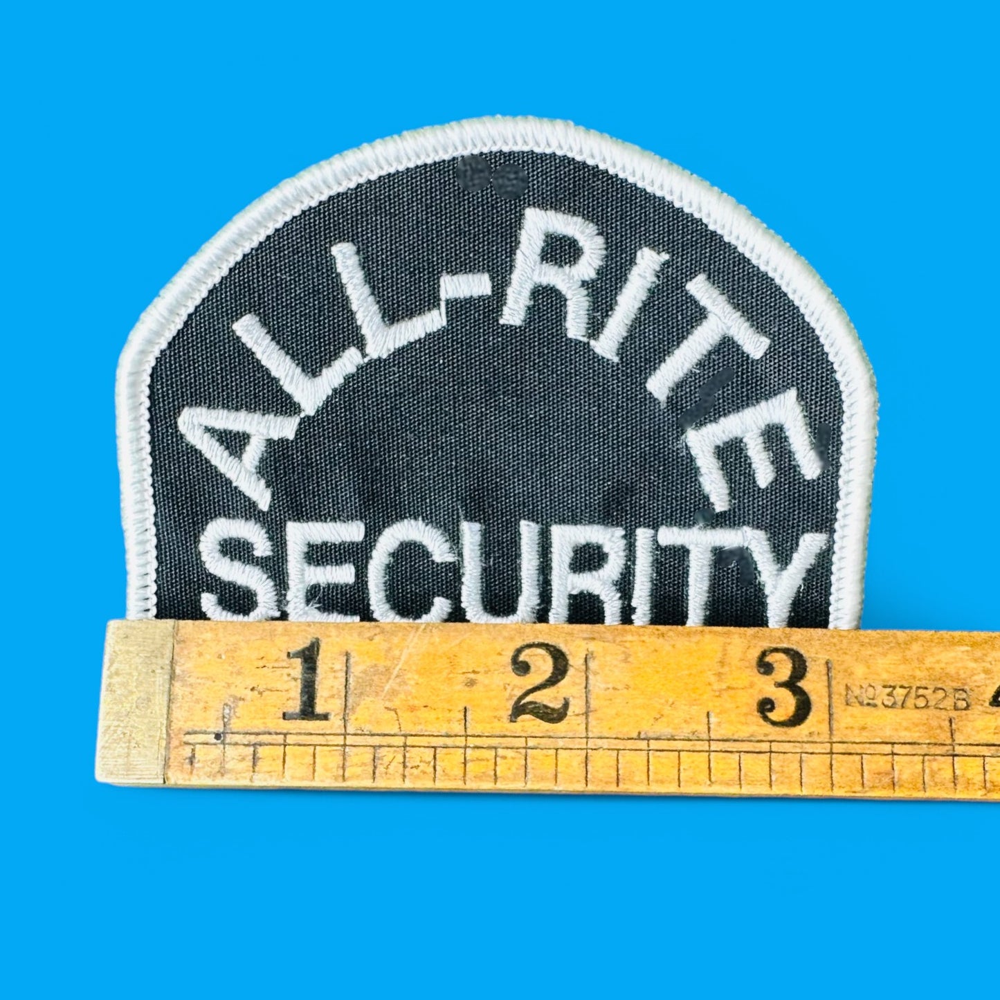 ALL-RITE Security Embroidered Patch - Vintage on a blue background, featuring white text and trim, perfect for caps.