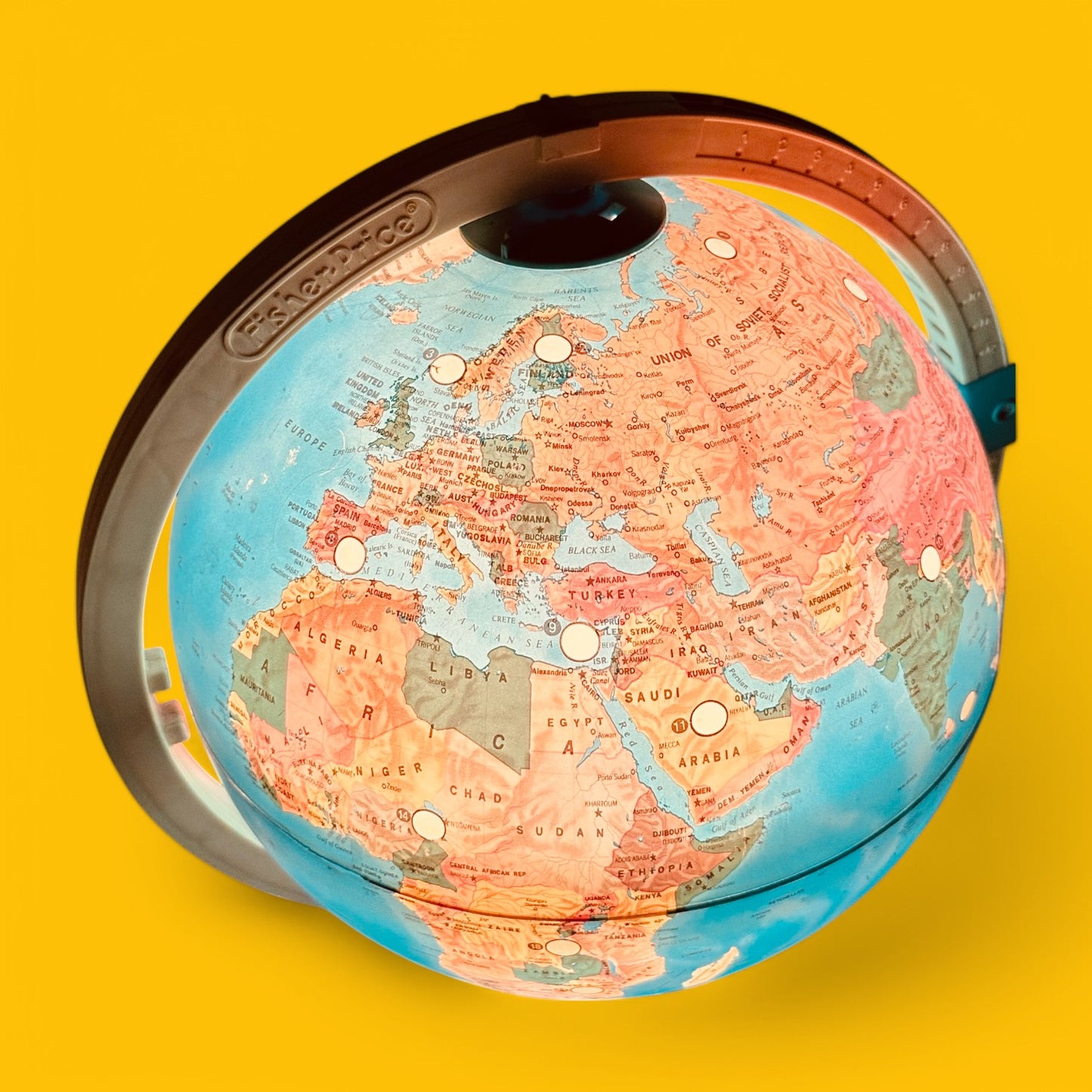 Fisher Price Illuminated Globe showcasing vibrant colors and interactive features for learning about the world.
