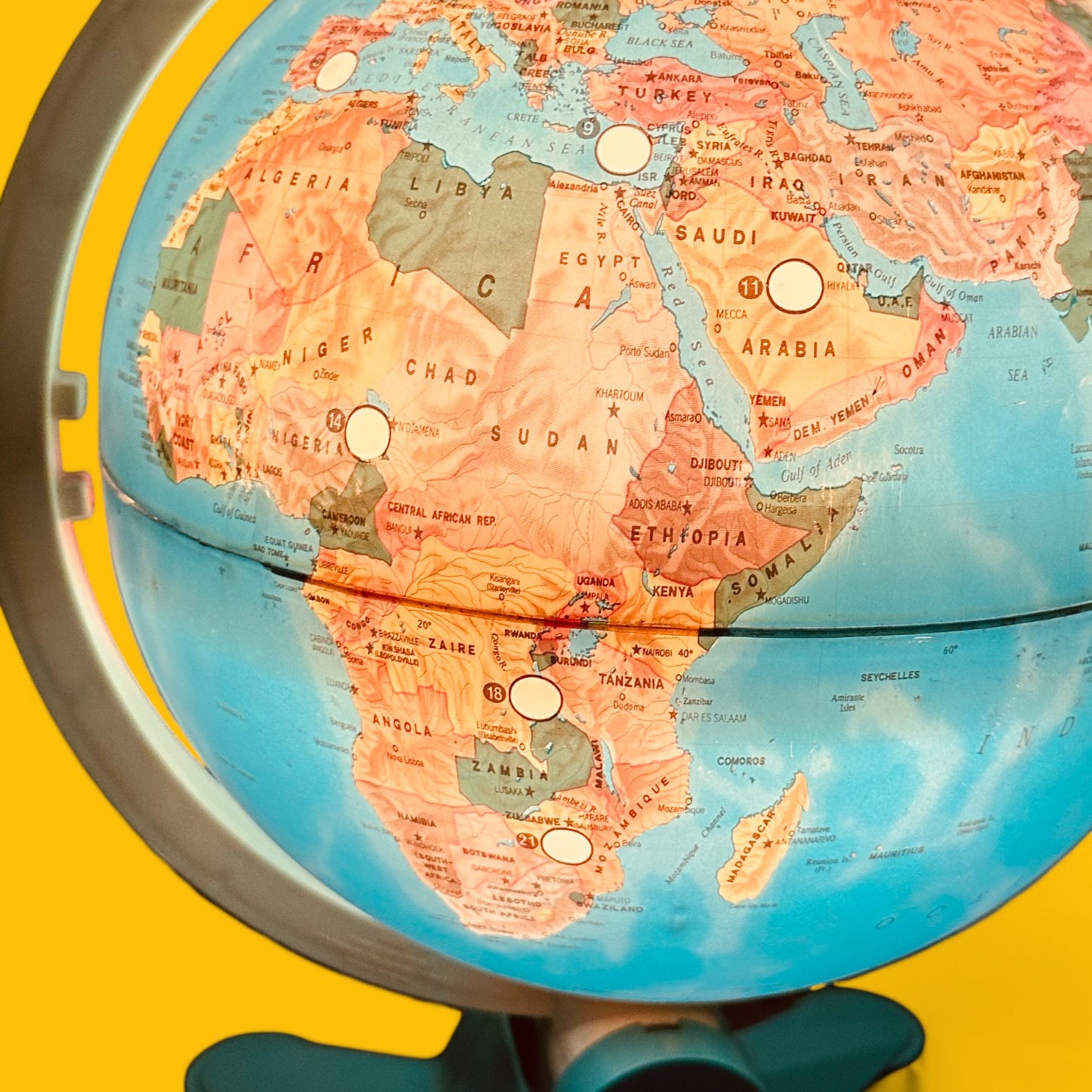Fisher Price Illuminated Globe showcasing vibrant maps and interactive locations, perfect for learning and decor.