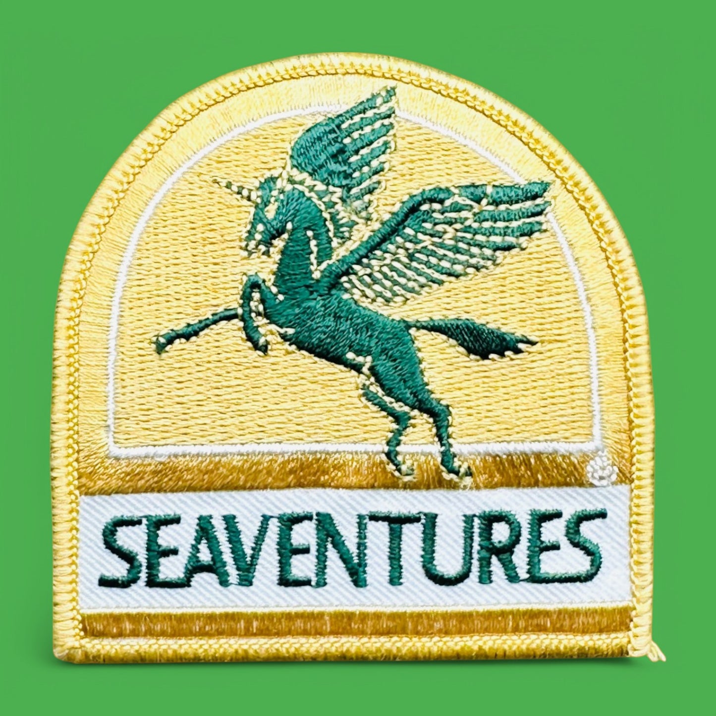 Seaventures Embroidered Patch with Iridescent Gold Design
