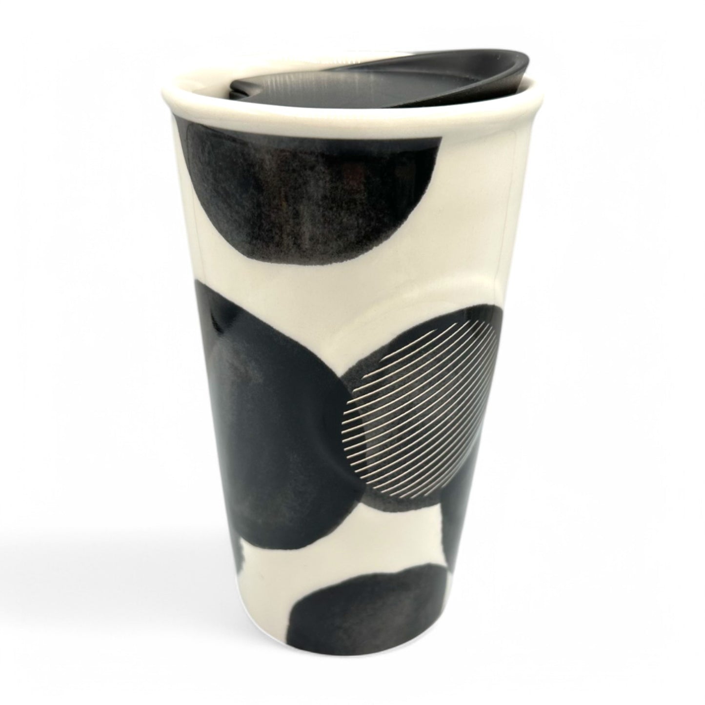 Stylish Starbucks Travel Tumbler Mug in black and white, ceramic, 10 FL/OZ with a modern design and black lid.