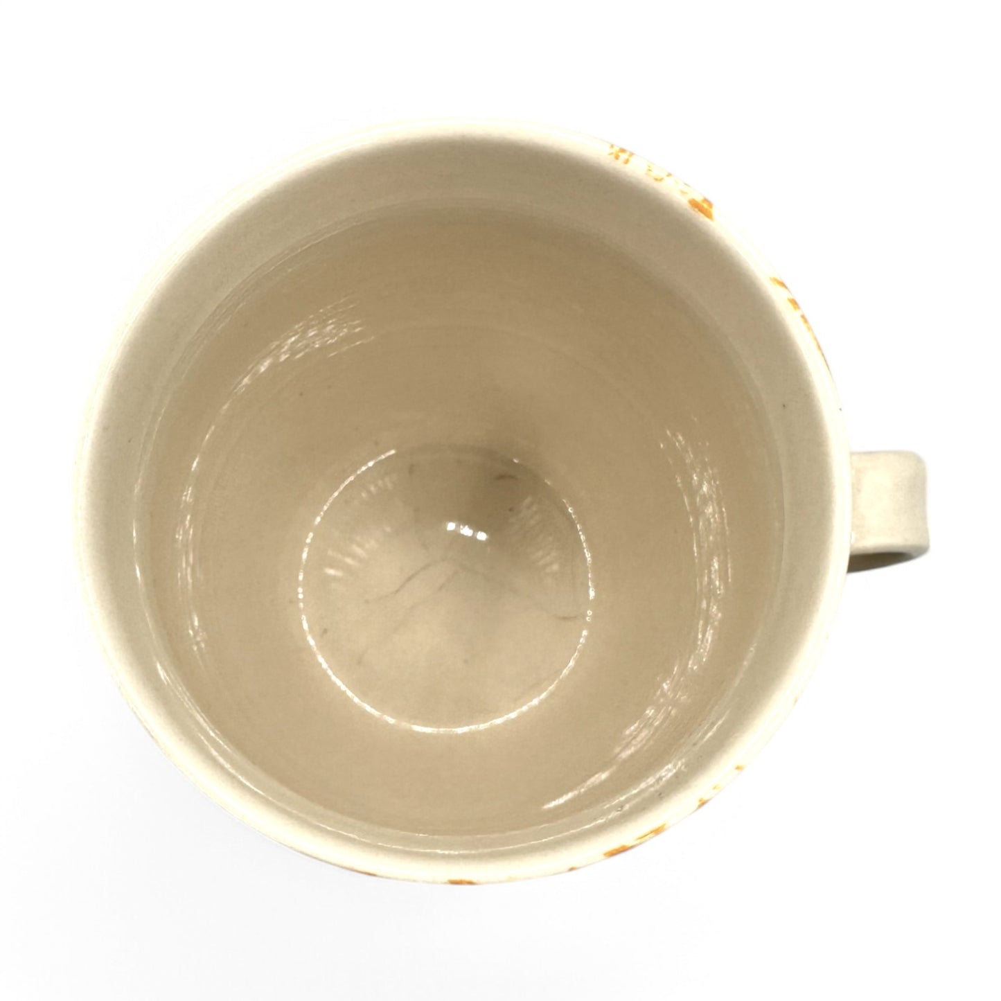 Curved Anthropologie Mug featuring Initial H, floral design in beige, yellow, and brown, with light crazing details.