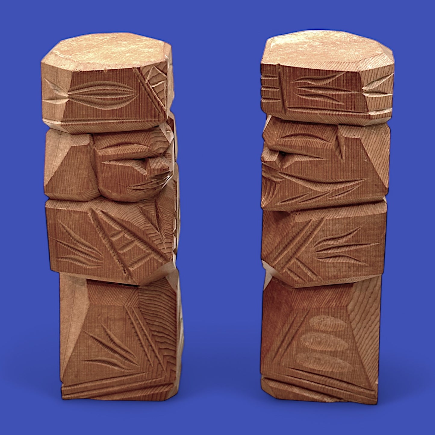 Vintage Japanese carved dolls showcasing an abstract Ainu couple, beautifully hand-carved from cedar wood.