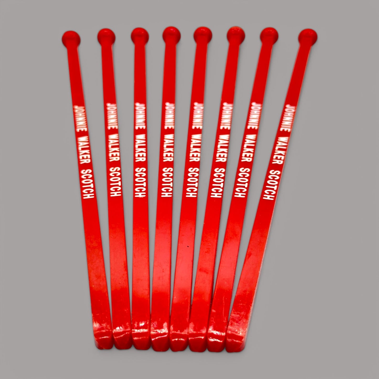 Vintage, red Johnnie Walker scotch stir sticks, lot of 8, perfect for drinks and collectors, each 6 inches long.