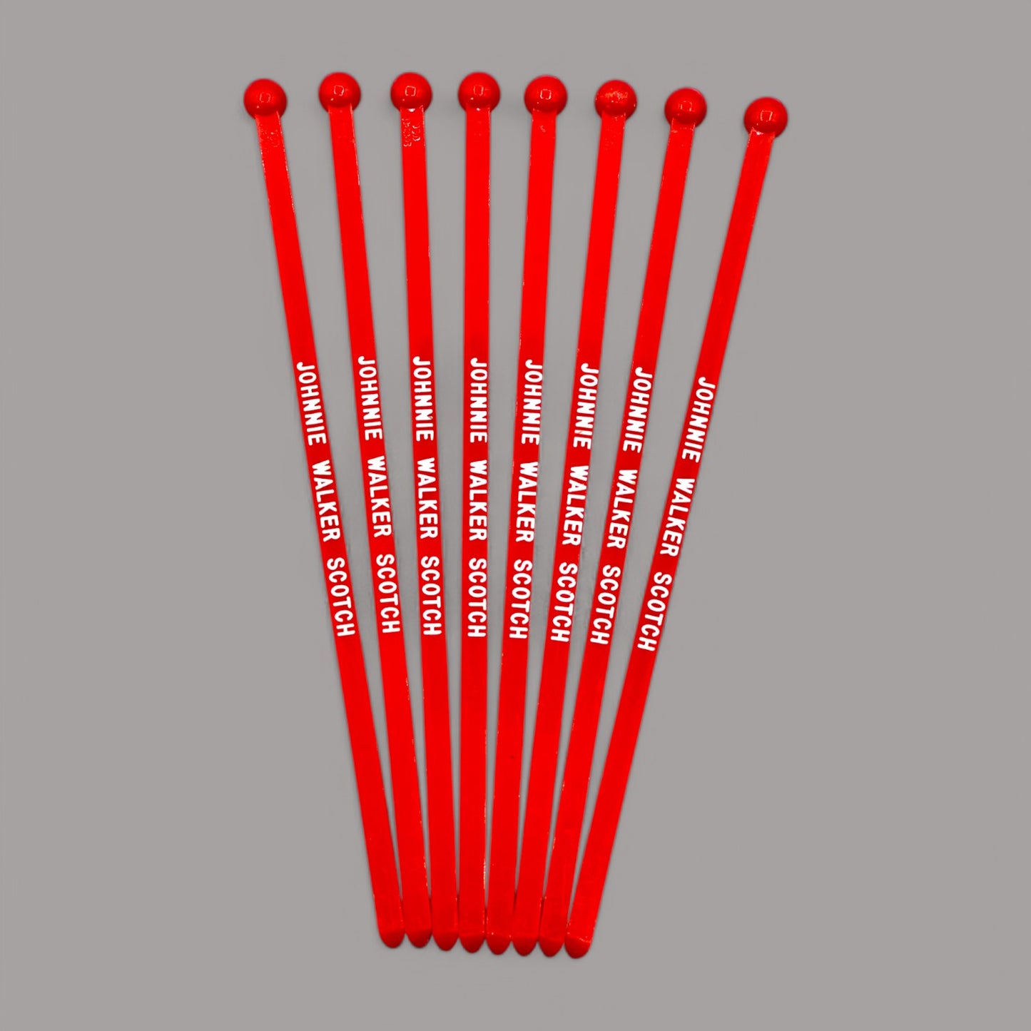Vintage, red, Johnnie Walker scotch stir sticks, lot of 8, perfect for drinks and collectibles. 6 inches long.