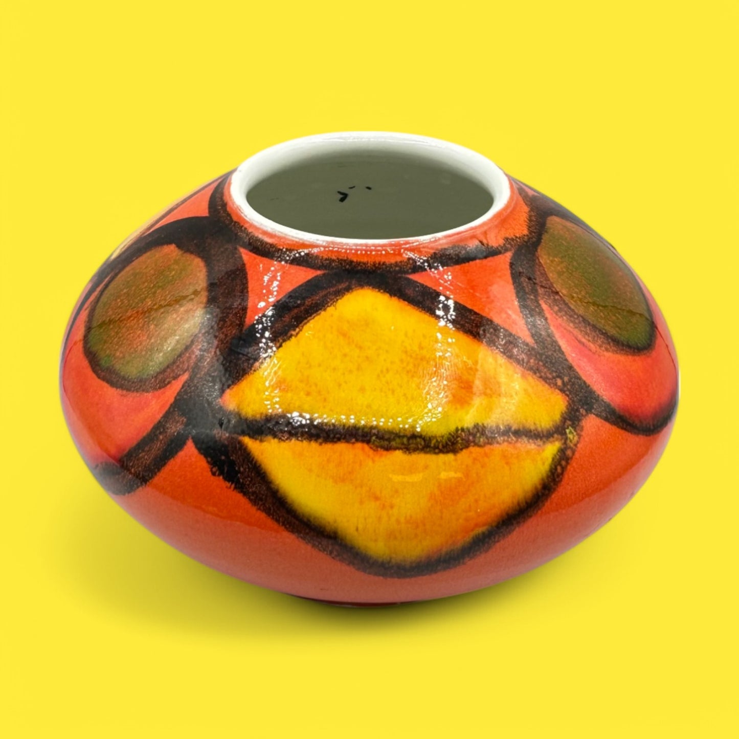 Vibrant Poole pottery number 32 onion vase with striking colors, designed by Robert Jefferson, perfect for collectors.