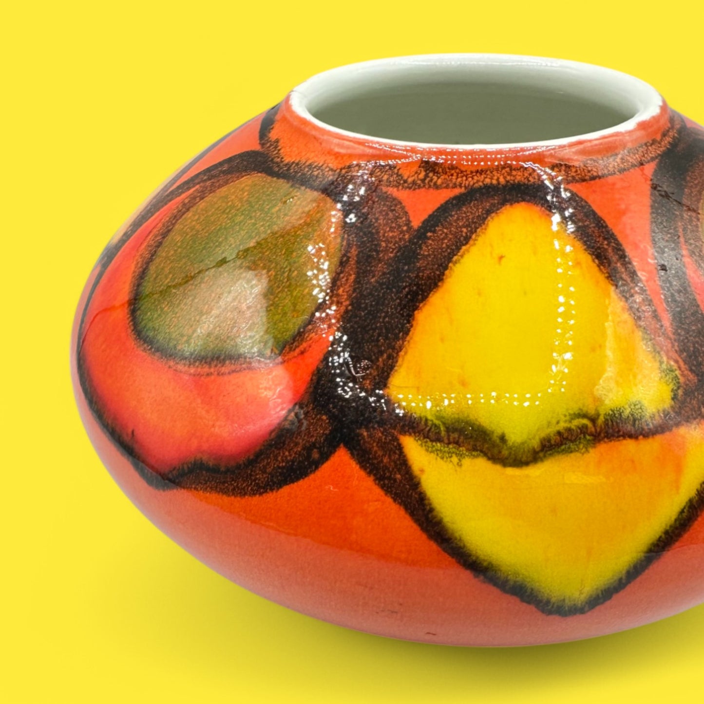 Vibrant Poole pottery number 32 onion vase showcasing bold colors and unique design, perfect for collectors.