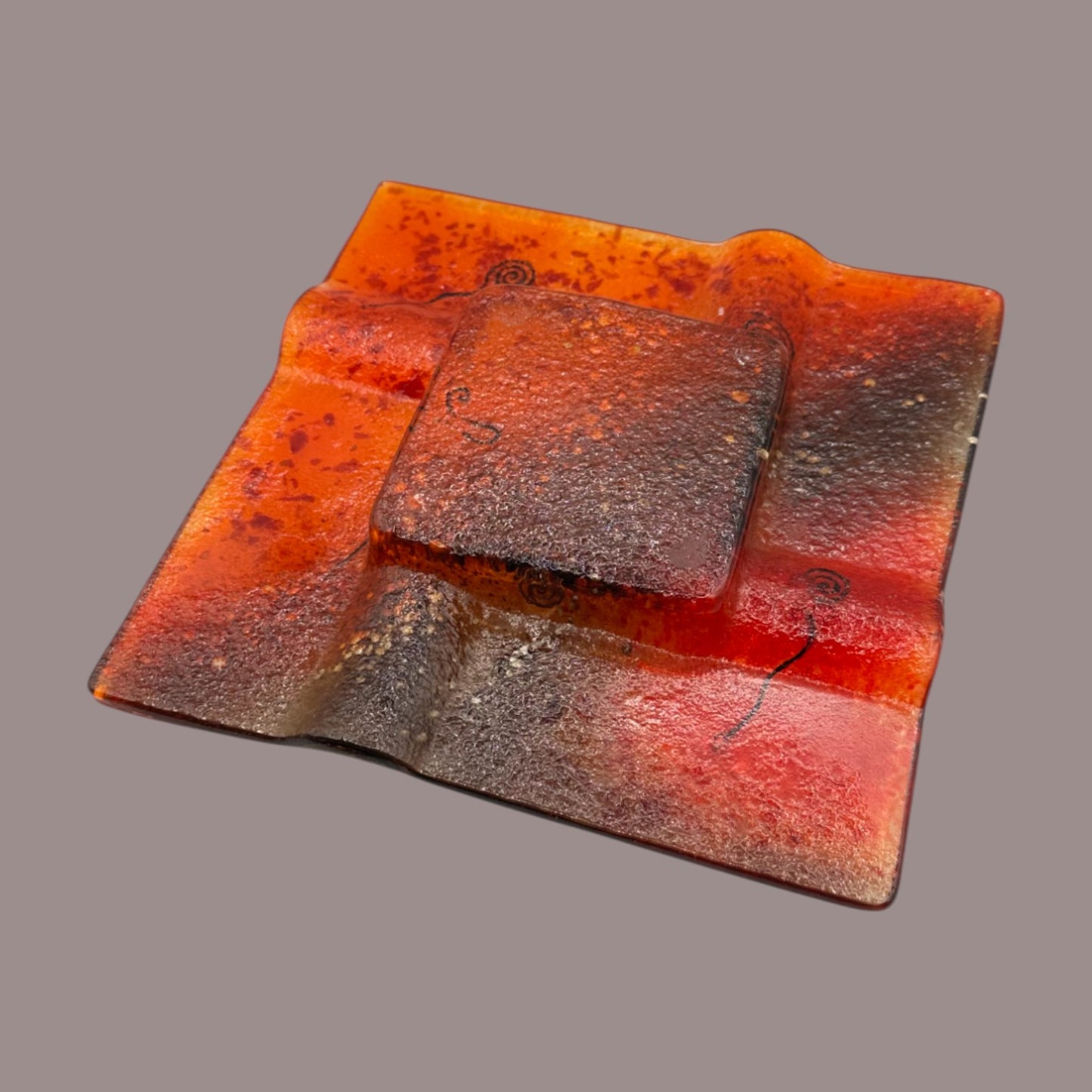 Vintage MCM Orange Fused Glass Sunburst Ashtray Decor showcases vibrant hues and unique textures, perfect for any retro collection.