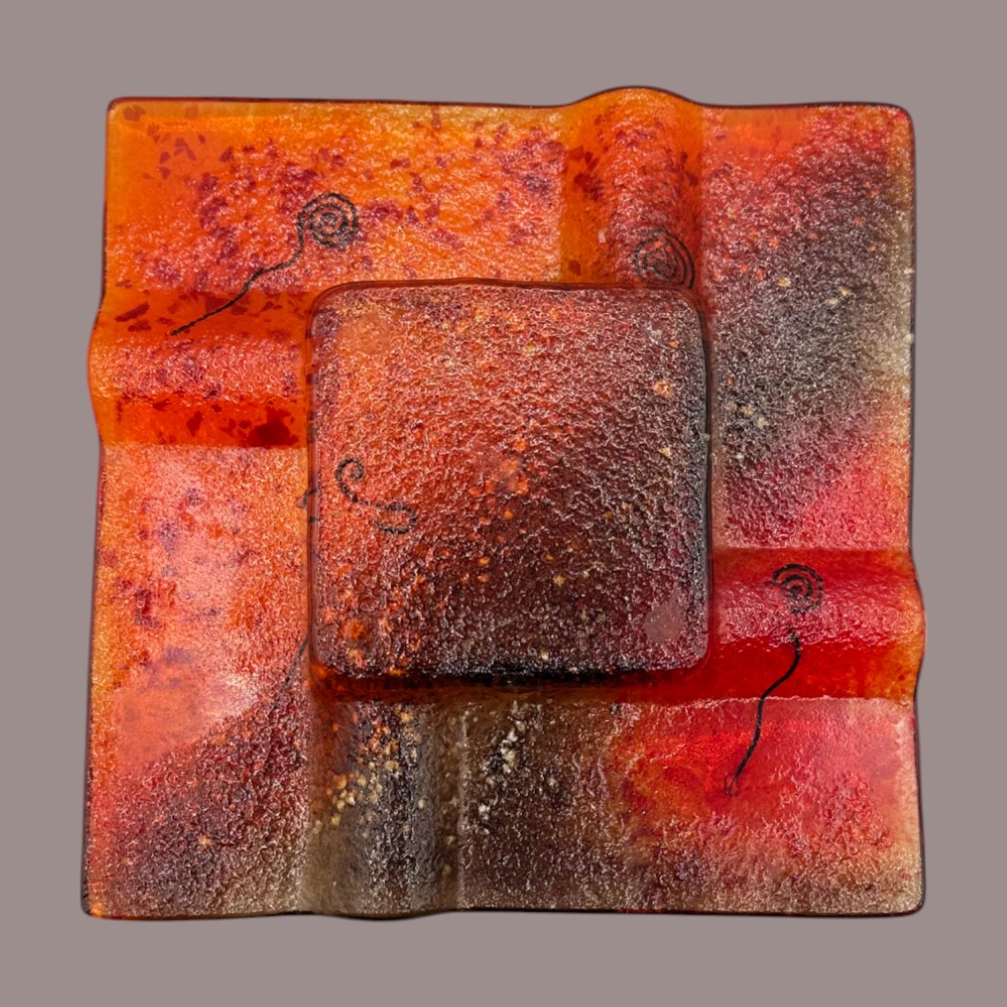 Vintage MCM Orange Fused Glass Sunburst Ashtray Decor features vibrant hues and unique textures, perfect for mid-century lovers.