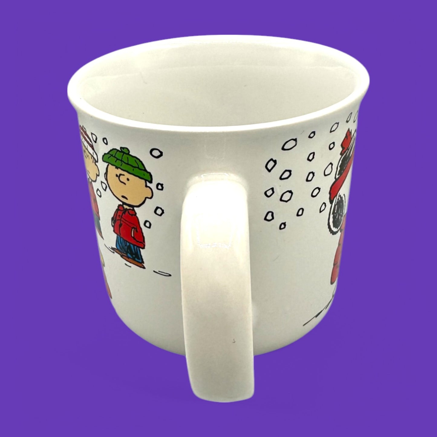 Cozy up with this Vintage Peanuts Snoopy winter mug featuring Snoopy and friends, perfect for collectors!
