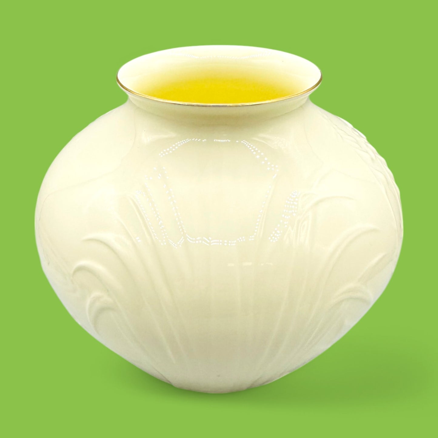 Pfaltzgraff Water Garden Vase, Dragonfly Embossed Bone China 6.5" adds elegance with creamy hues and floral details.