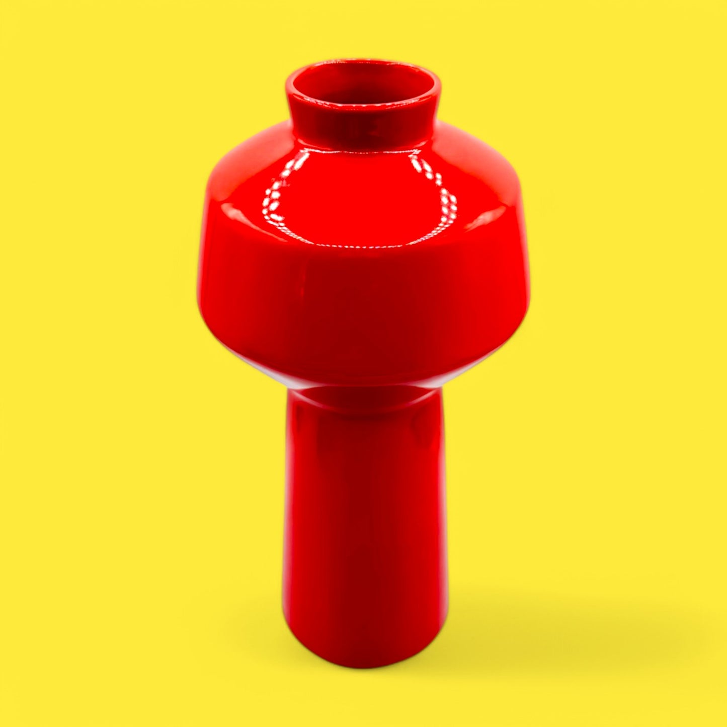 Brighten your decor with the EQ3 Carnaby Red Vase, Mid-Century Modern Inspired Pop, featuring a glossy red finish.