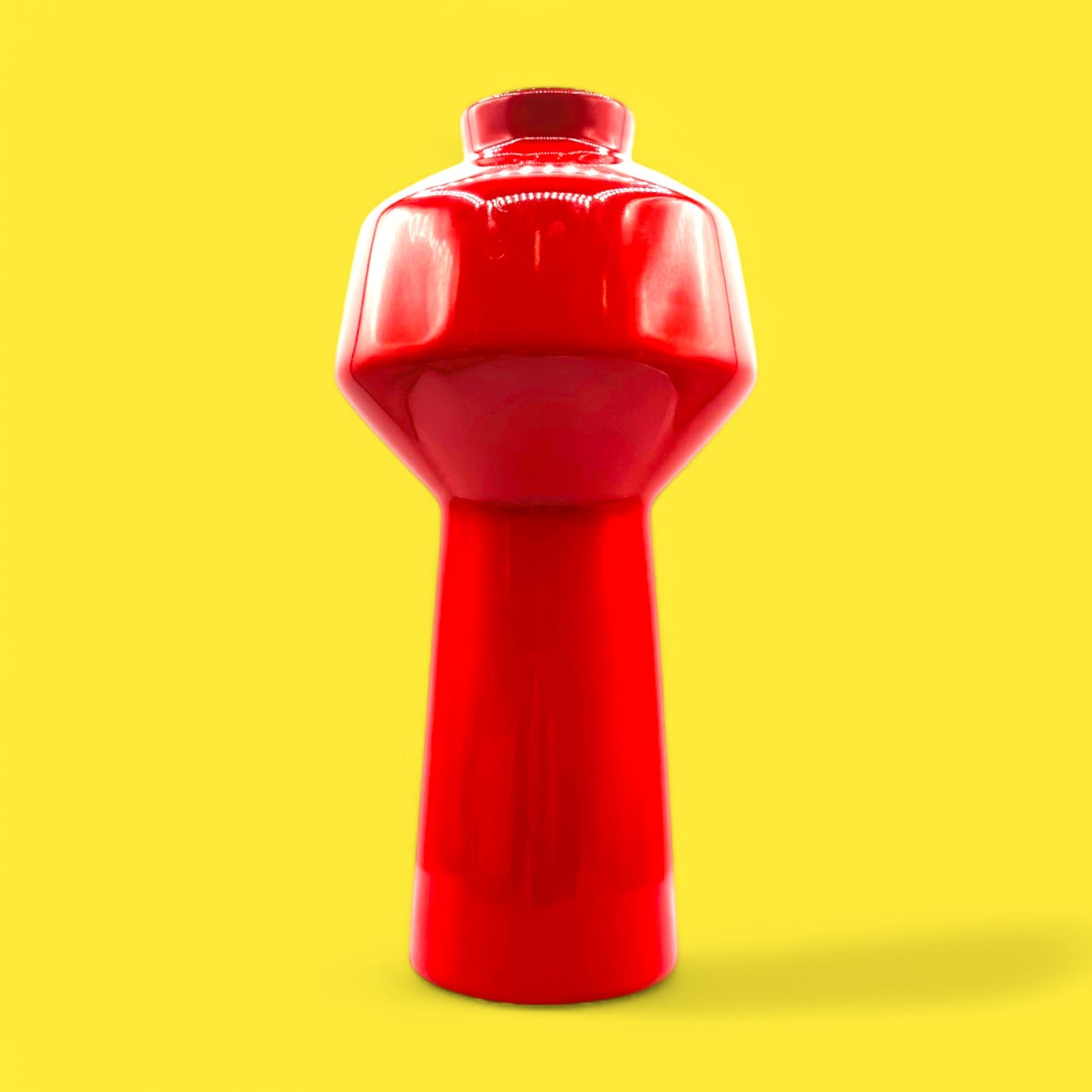Bold and glossy, the EQ3 Carnaby Red Vase, Mid-Century Modern Inspired Pop adds vibrant color to any decor.