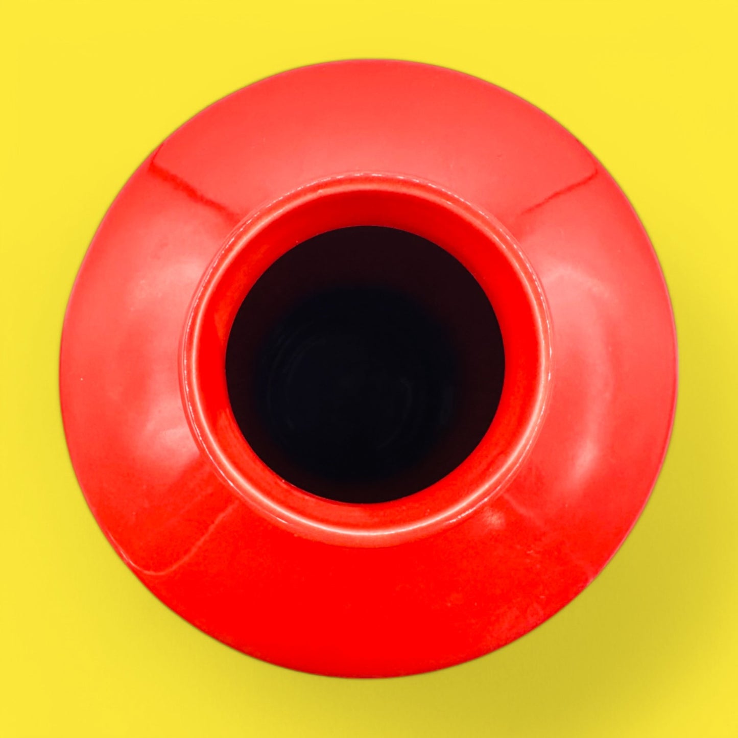 Bold and glossy, the EQ3 Carnaby Red Vase, Mid-Century Modern Inspired Pop enhances any space with vibrant style.