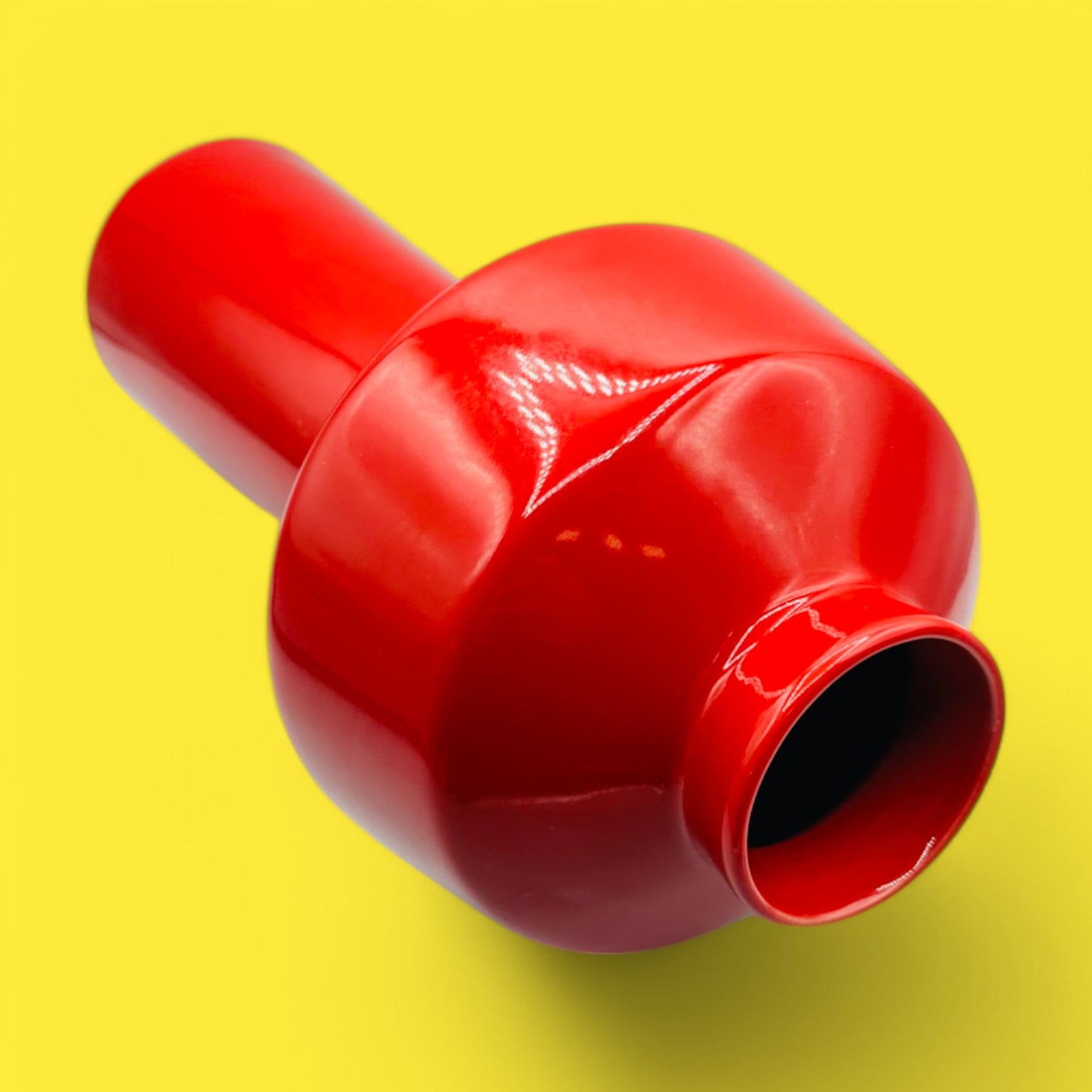 Brighten your decor with the EQ3 Carnaby Red Vase, Mid-Century Modern Inspired Pop, showcasing bold geometric design.