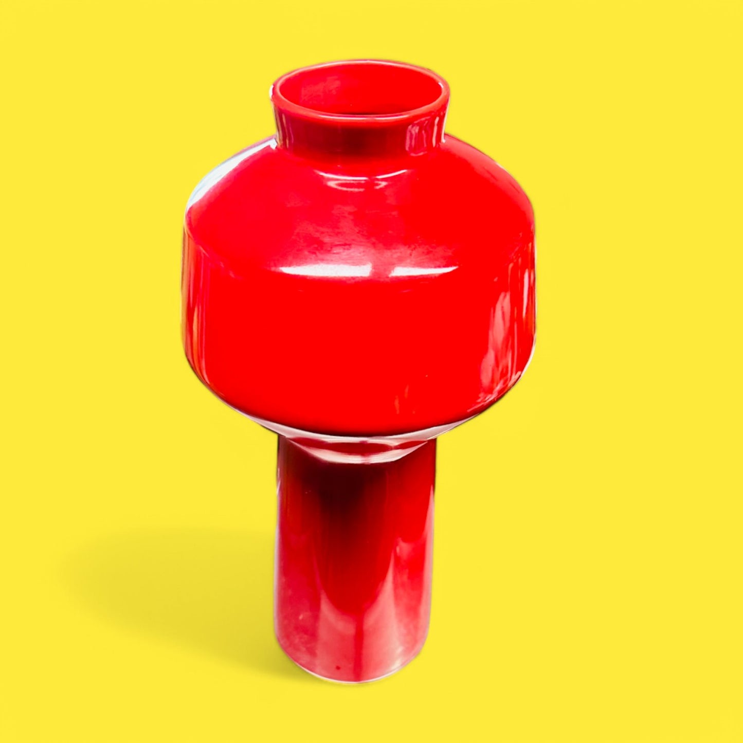 Brighten your decor with the EQ3 Carnaby Red Vase, Mid-Century Modern Inspired Pop featuring a glossy geometric design.