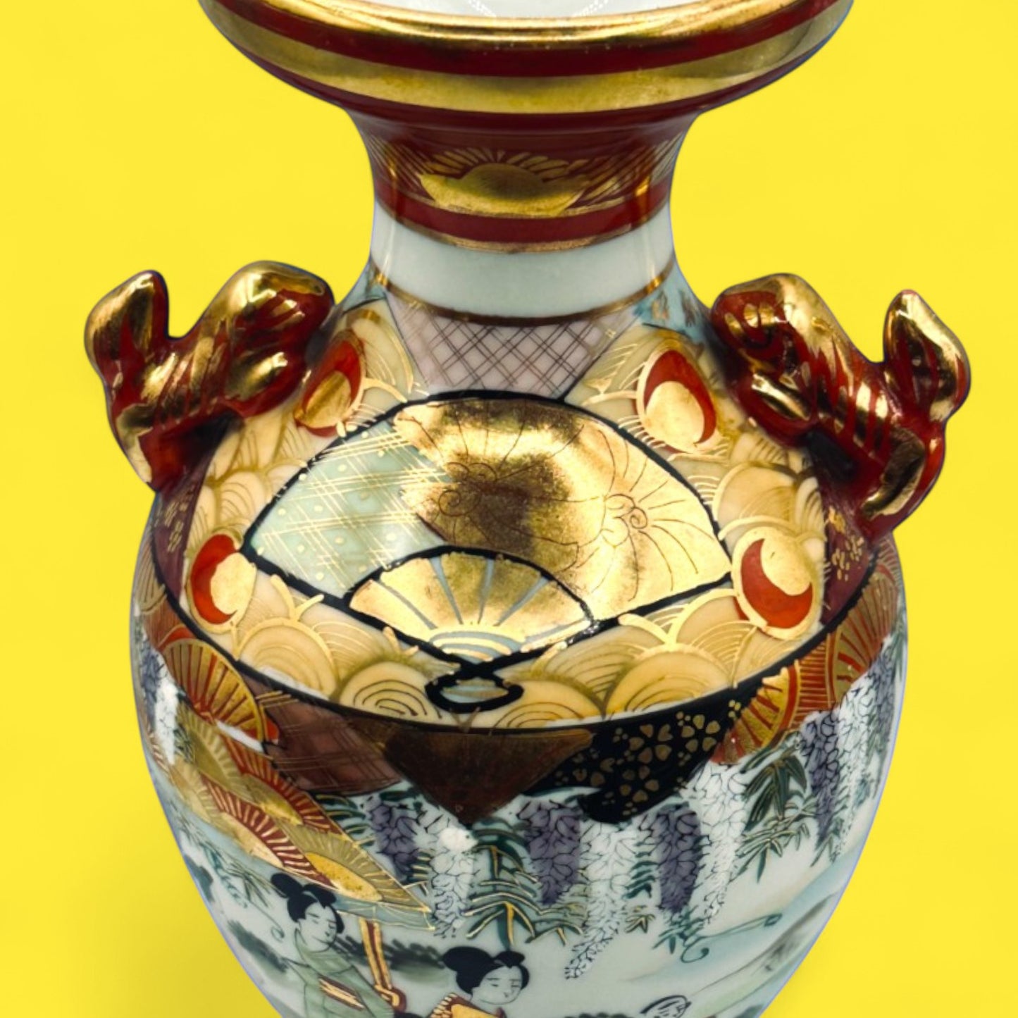 Meiji Period hand-painted Kutani vase with foo dog handles 25 cm tall