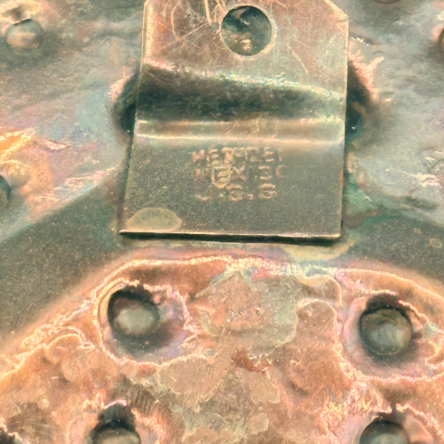 Vintage round copper plate with Aztec sun god design