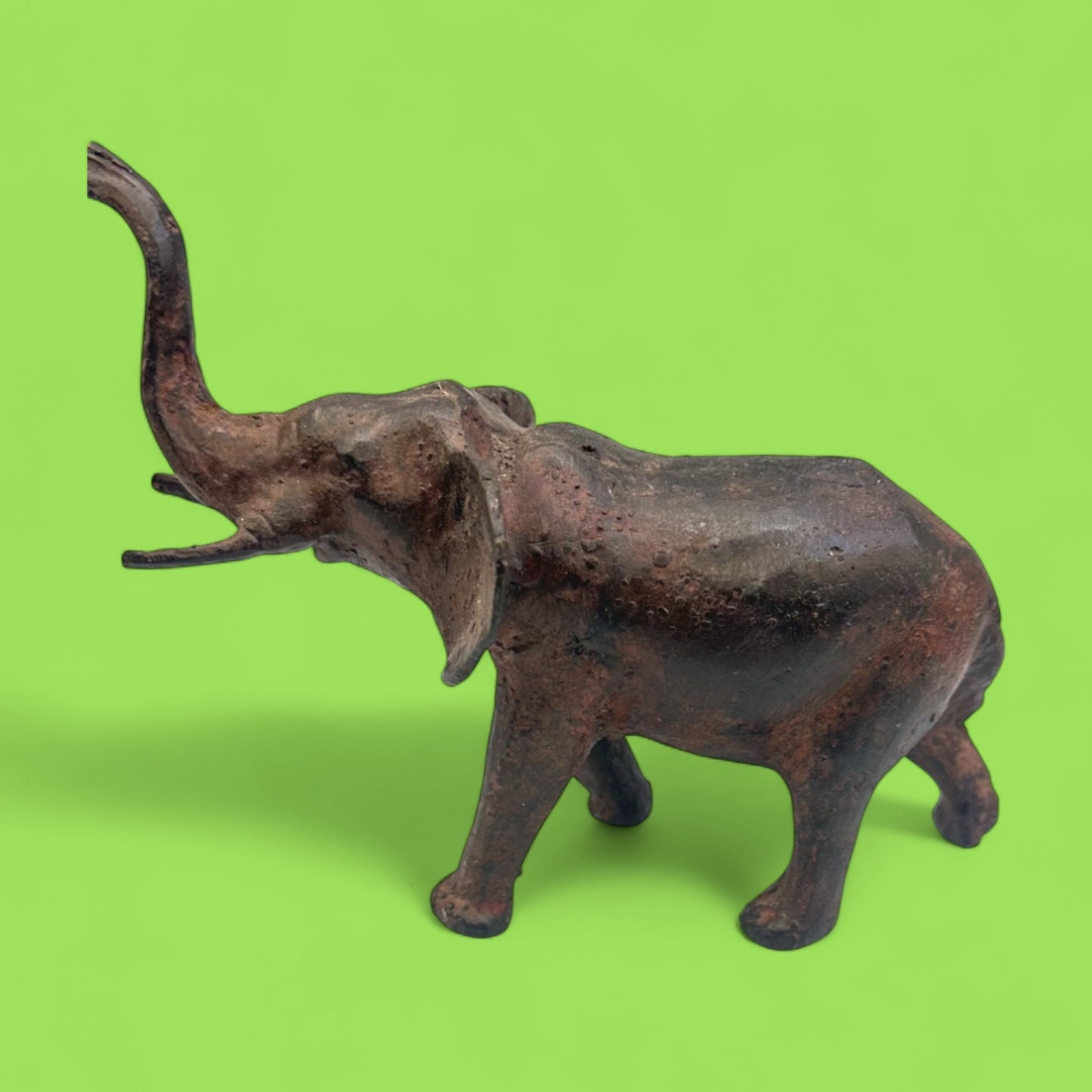 Vintage Cast Iron Elephant Statue with Raised Trunk