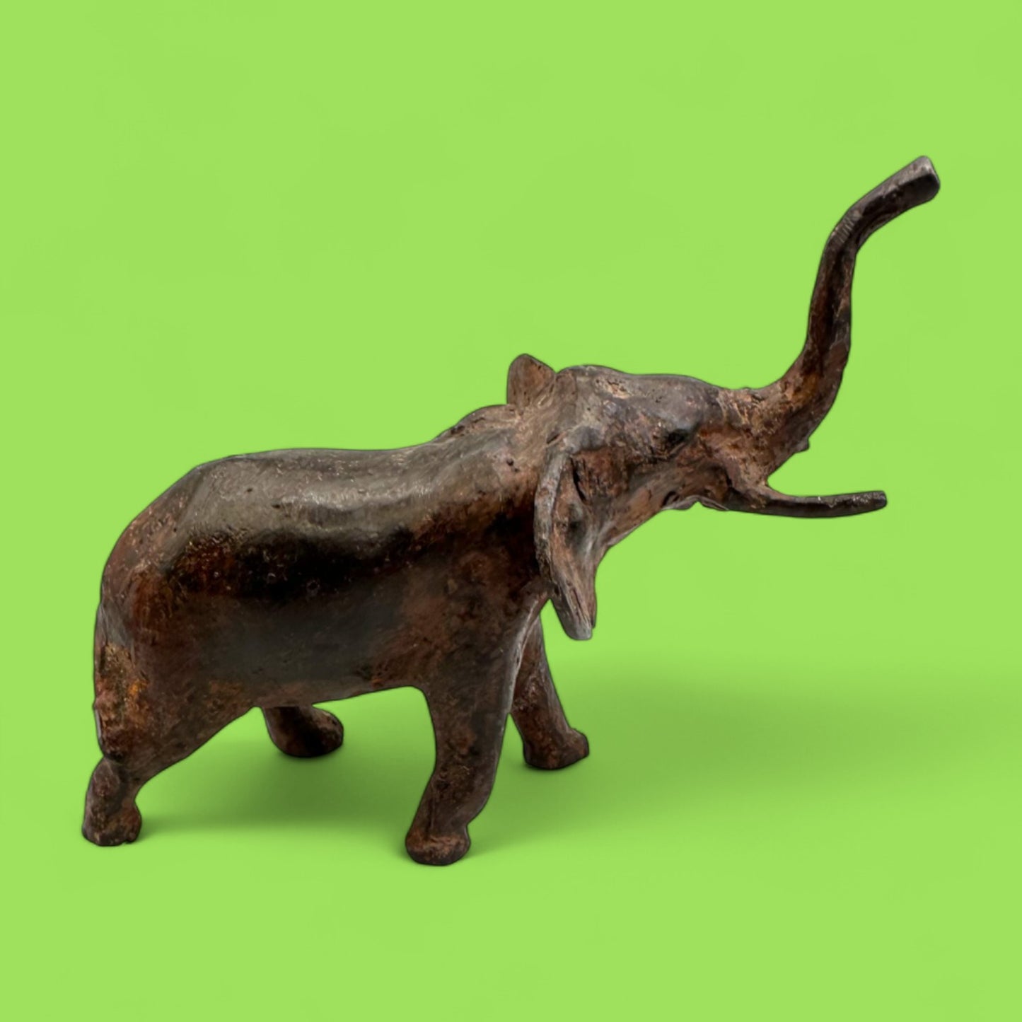 Vintage Cast Iron Elephant Statue with Raised Trunk