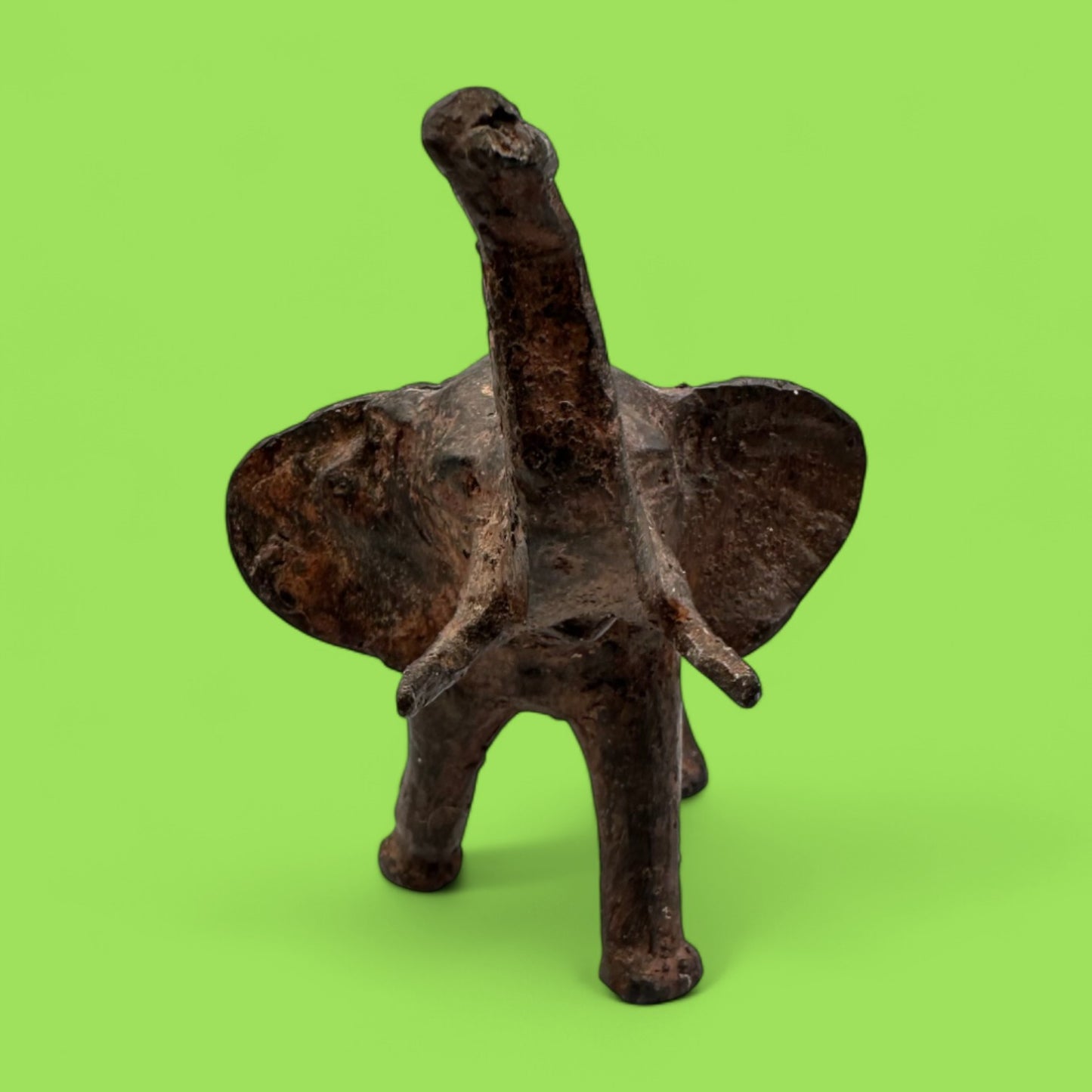 Vintage Cast Iron Elephant Statue with Raised Trunk