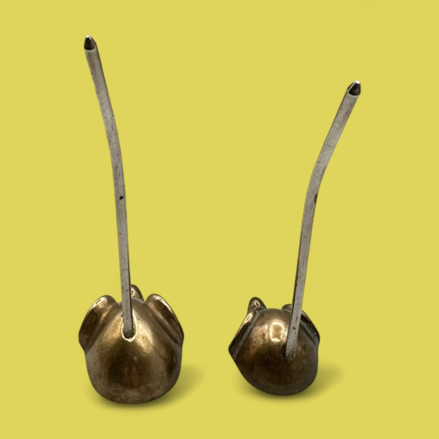 Pair of mid-century modern brass mice with curved tails
