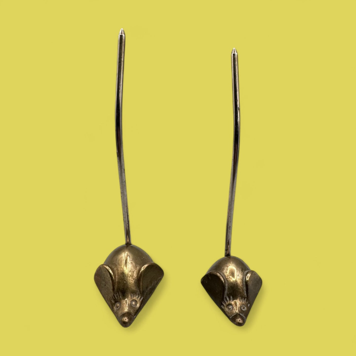 Pair of mid-century modern brass mice with curved tails