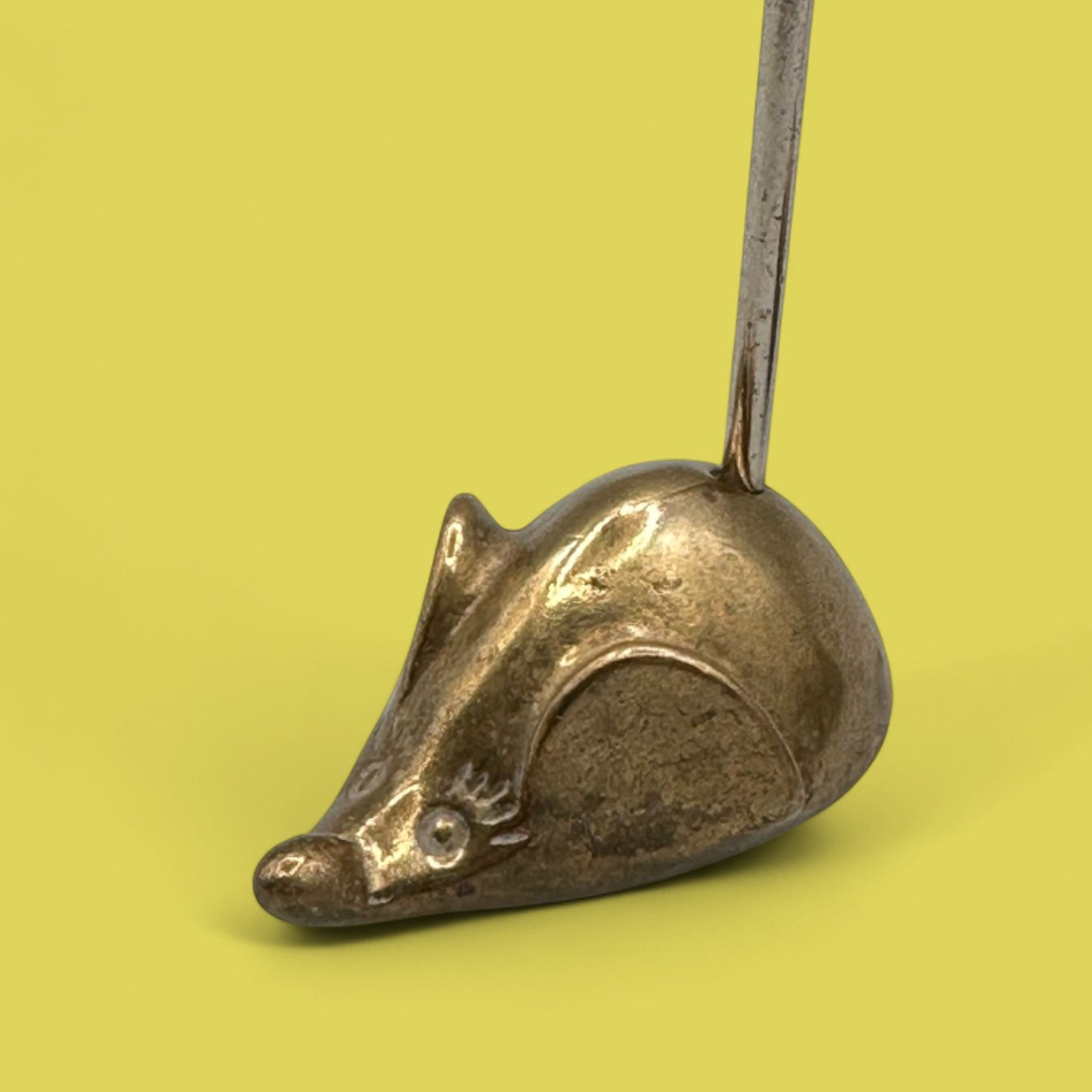 Pair of mid-century modern brass mice with curved tails