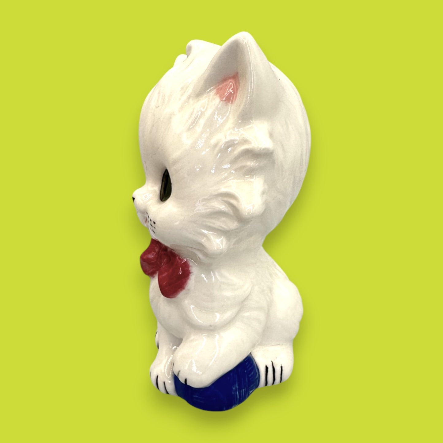 Vintage White Ceramic Cat Figurine with Red Bow and Blue Yarn