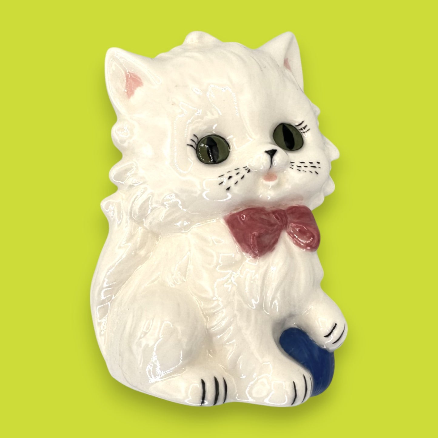 Vintage White Ceramic Cat Figurine with Red Bow and Blue Yarn