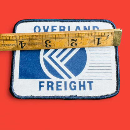 Overland freight embroidered patch, a stylish tribute for truck enthusiasts, perfect for vintage trucker hats.