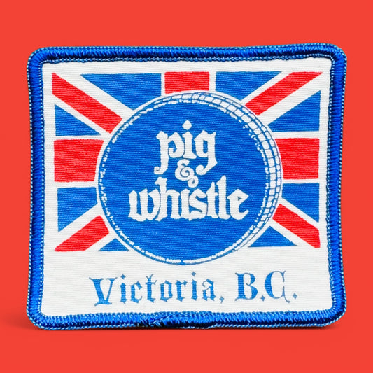 Vintage Pig & Whistle patch with Union Jack background and blue trim, from Victoria BC, measuring 3.5" x 3".