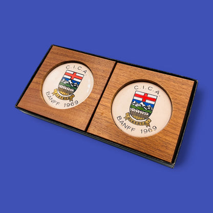 MCM 1960's Teak Drink Coaster Set | Convention: C.I.C.A Banff Alberta 1969 features classy designs with Alberta Crest.