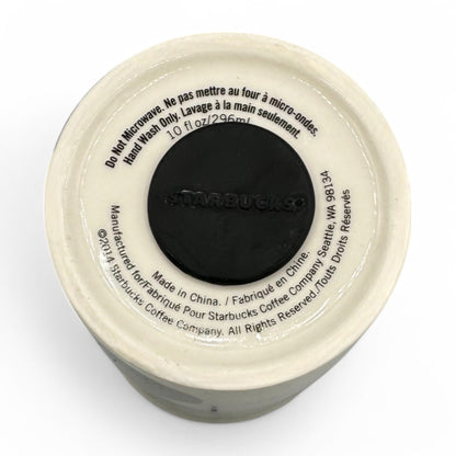 Starbucks Travel Tumbler Mug features a modern black and white watercolor design, insulated with a black lid.