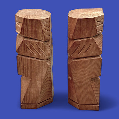 Hand-carved Japanese carved dolls showcase an abstract couple in unique cedar wood, reflecting rich Ainu culture.