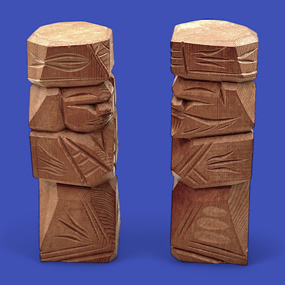 Vintage Japanese carved dolls showcasing an abstract Ainu couple, beautifully hand-carved from cedar wood.