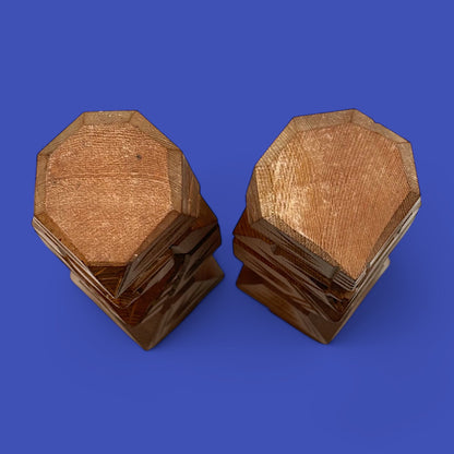 Vintage Japanese carved dolls showcasing a unique Ainu couple in abstract style, crafted from cedar wood.