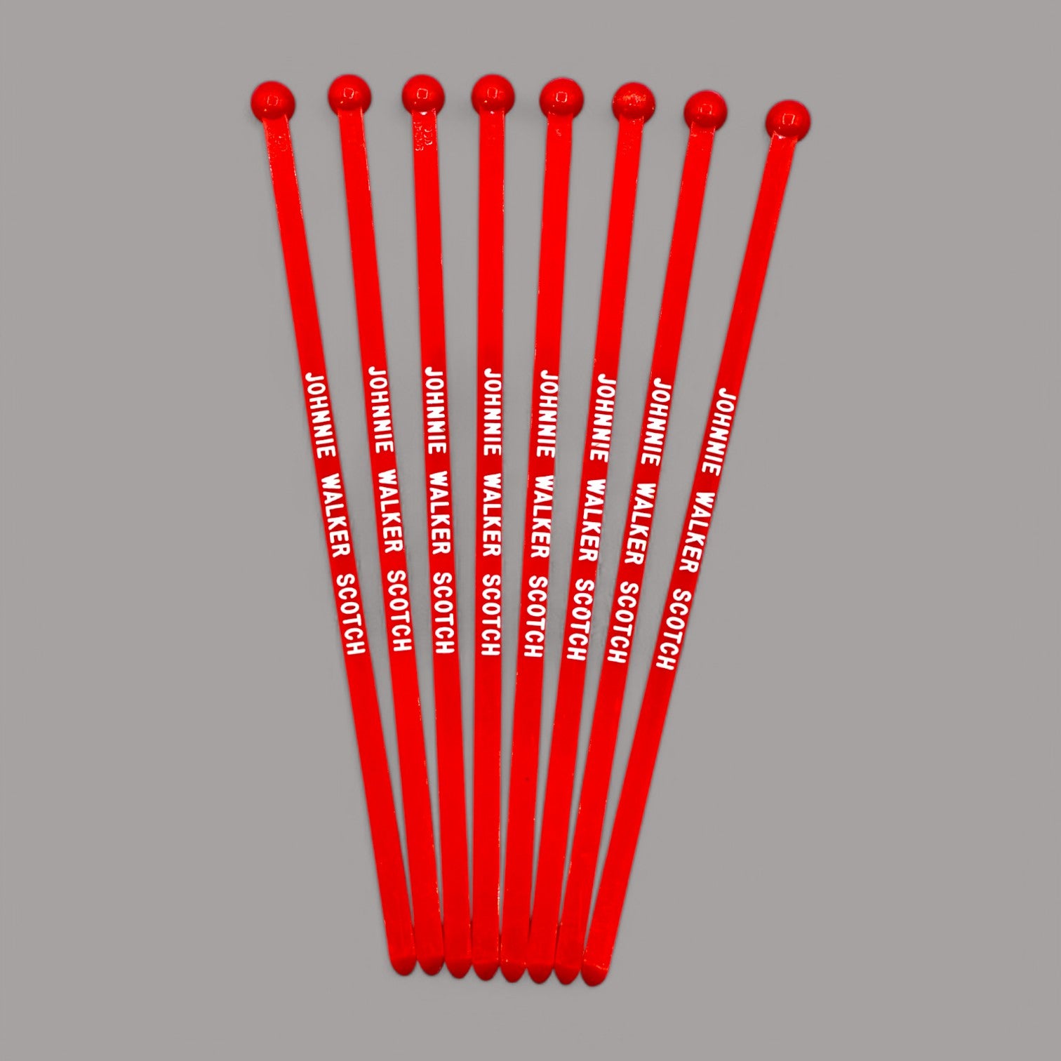 Vintage, red, Johnnie Walker scotch stir sticks, lot of 8, perfect for drinks and collectibles. 6 inches long.