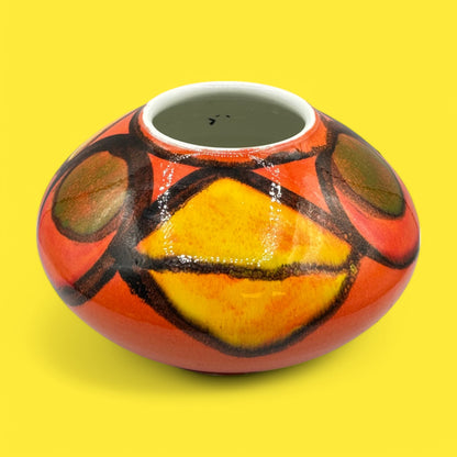 Vibrant Poole pottery number 32 onion vase with striking colors, designed by Robert Jefferson, perfect for collectors.