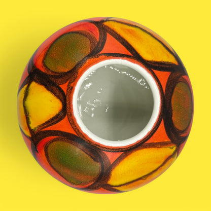 Vibrant Poole pottery number 32 onion vase showcasing bold patterns, a stunning piece by Robert Jefferson.