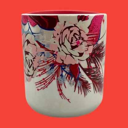 Starbucks, red floral mug featuring vibrant floral designs, perfect for holiday beverages and travel.