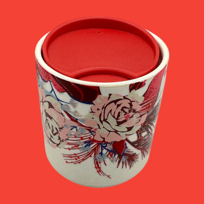 Starbucks, red floral mug features a vibrant design with a red lid, perfect for holiday travel. Hand wash only.