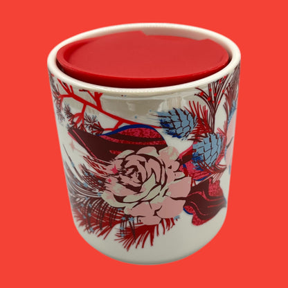 Colorful Starbucks red floral mug with a red lid, perfect for enjoying your favorite drinks. Ideal for holiday gifting!