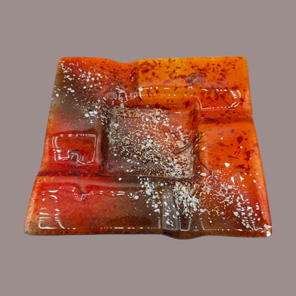 Vintage MCM Orange Fused Glass Sunburst Ashtray Decor showcases vibrant hues and unique textures for mid-century charm.