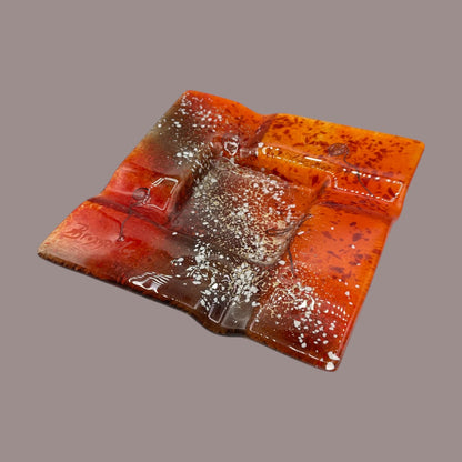 Vintage MCM Orange Fused Glass Sunburst Ashtray Decor, a stunning mid-century piece capturing vibrant sunset hues.