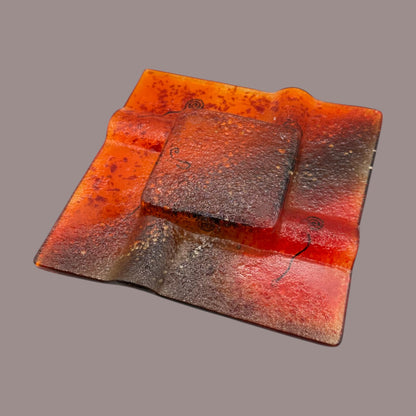 Vintage MCM Orange Fused Glass Sunburst Ashtray Decor showcases vibrant hues and unique textures, perfect for any retro collection.