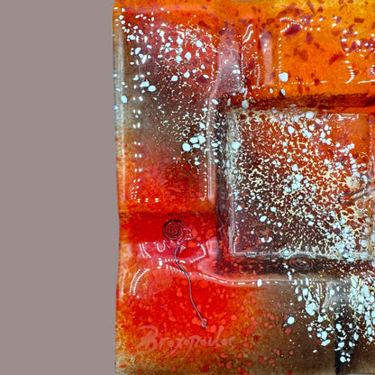 Vintage MCM Orange Fused Glass Sunburst Ashtray Decor showcases vibrant hues and textures, perfect for mid-century styling.