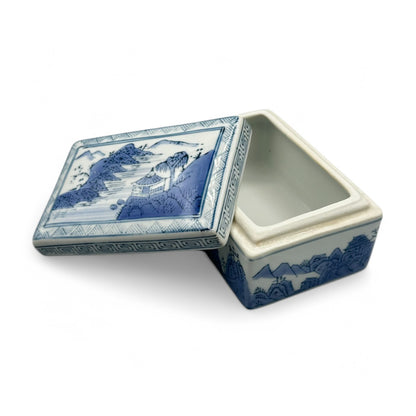 Elegant blue and white Chinese ceramic trinket box / ink box featuring traditional landscape designs, perfect for home decor.