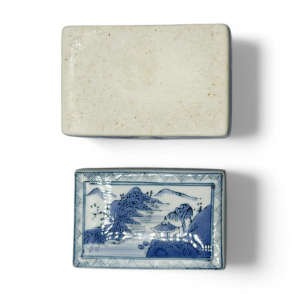 Elegant blue and white Chinese ceramic trinket box / ink box featuring traditional landscape designs, dating from 1920-1950.