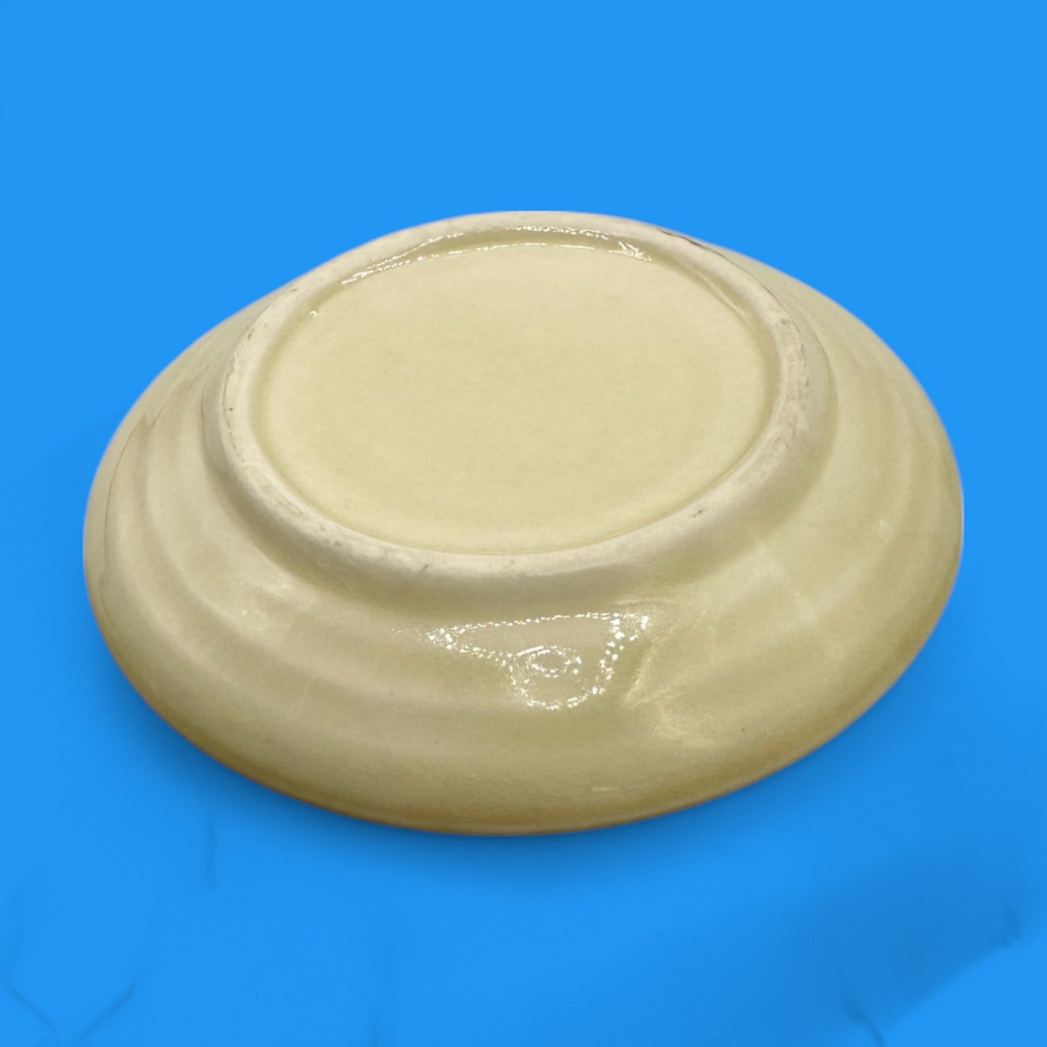 Elegant Vintage Japanese Celadon Dish - Plum Blossom Design, showcasing delicate jade-like glaze and vibrant hand-painted details.